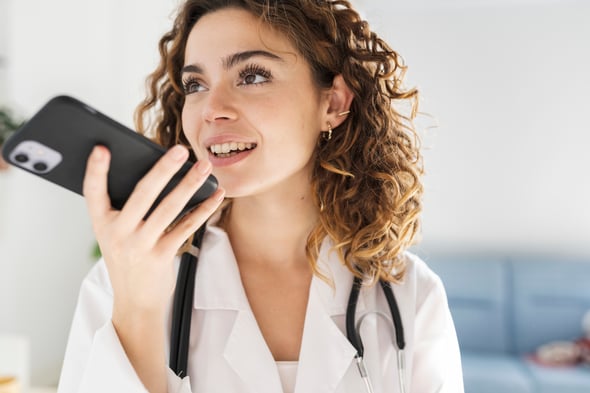 female-european-adult-doctor-talking-on-her-phone-print-1