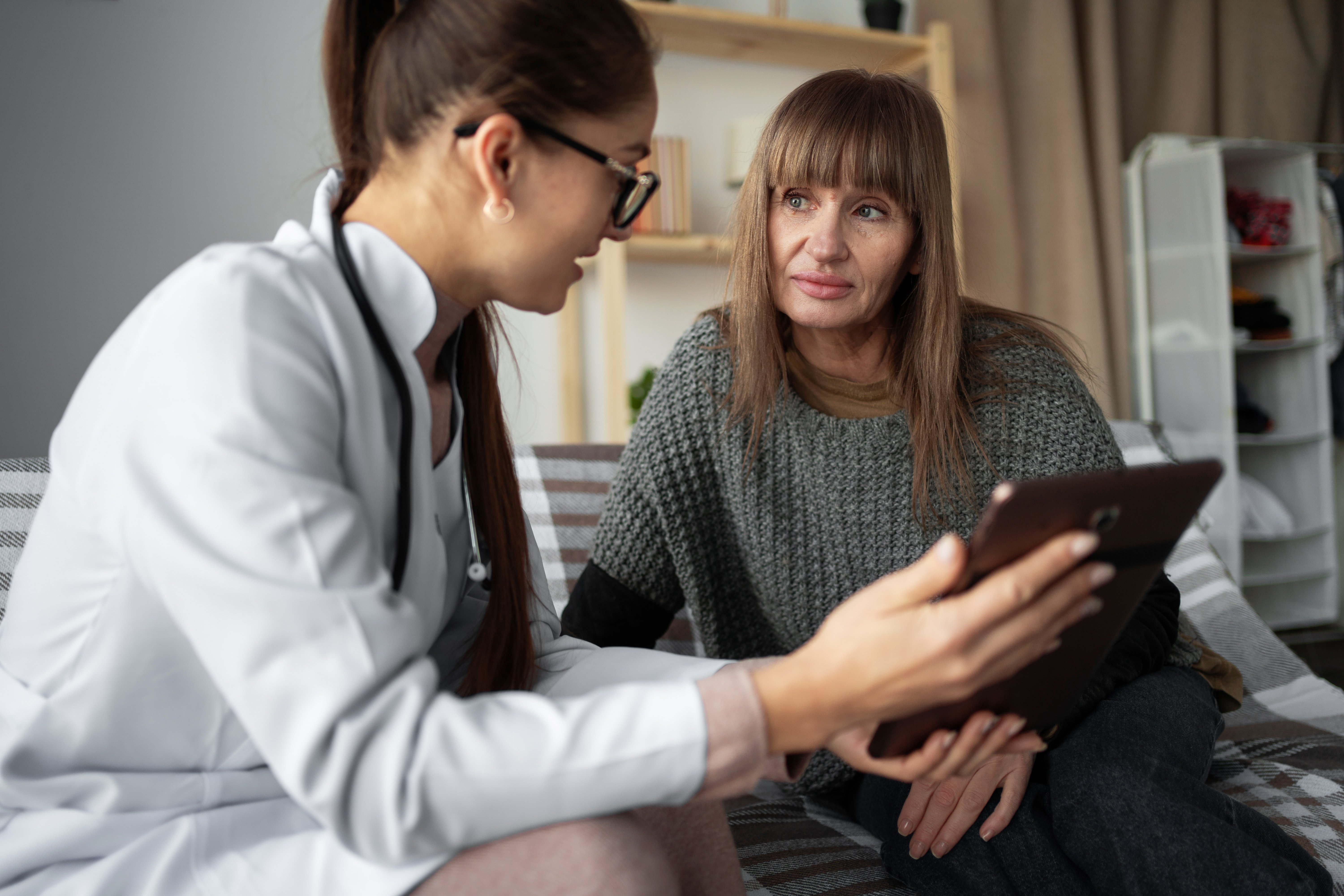 female-european-adult-patient-clinic-receiving-analysis-results-web