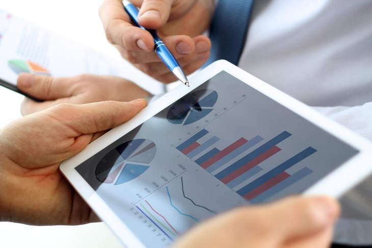 male-european-adult-business-close-up-of-tablet-with-chart-print